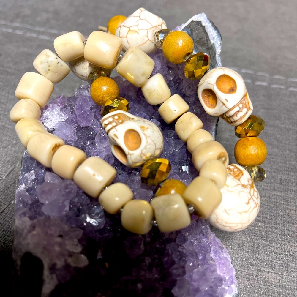 Wooden skull and coral bracelets
